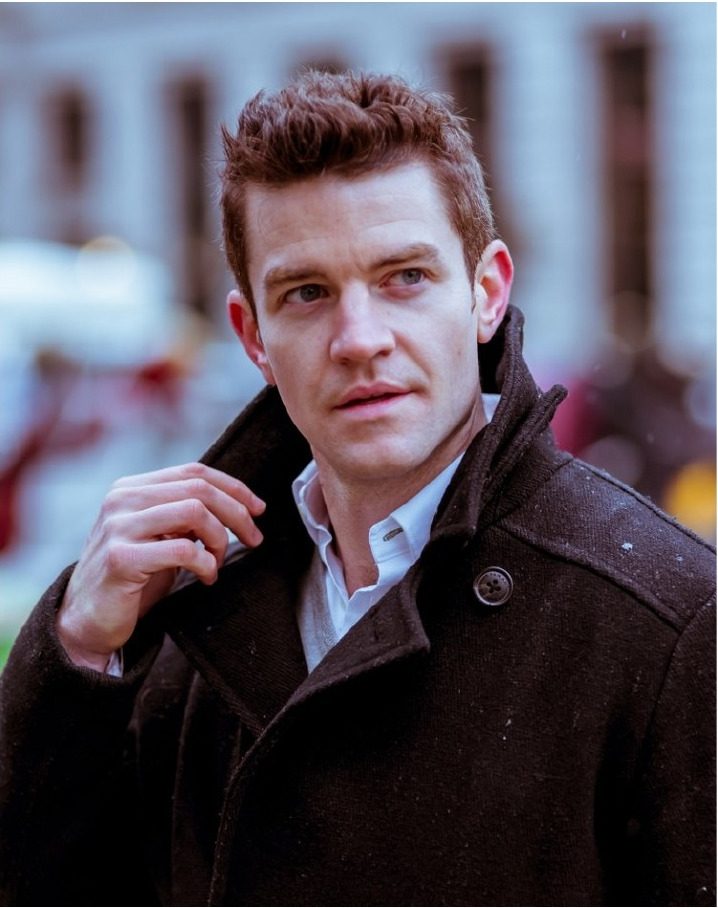 Los Angeles fit model Joe Cummings presenting a dark wool outerwear coat